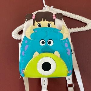 Loungefly Pixar Backpack “We Care Because We Care” 20 Year Anniversary Edition